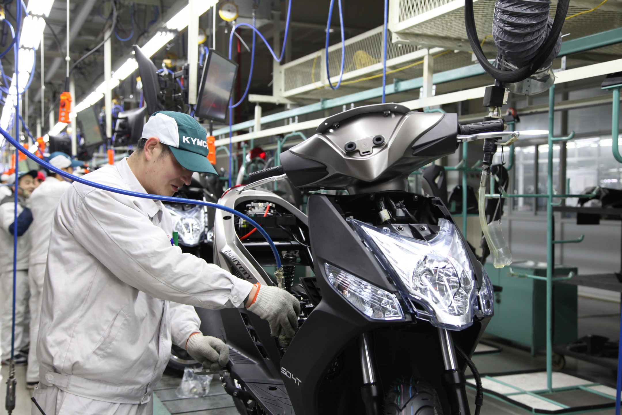 Cadena de producción de Agility City 50, en el centro industrial KYMCO Changzou. KYMCO Global