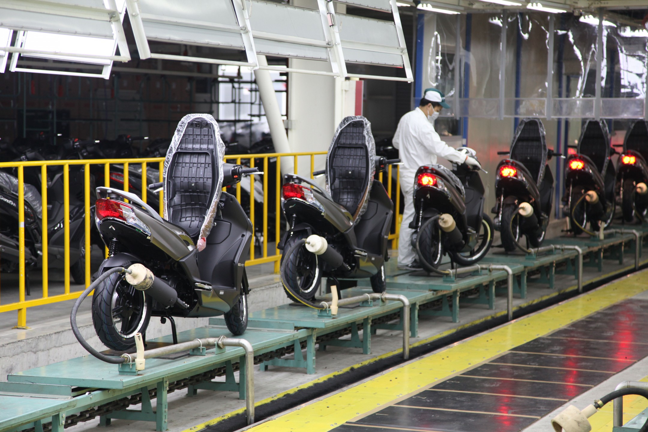 Cadena de producción de Agility City 50, en el centro industrial KYMCO Changzou. KYMCO Global